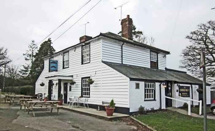 white timber clad pub